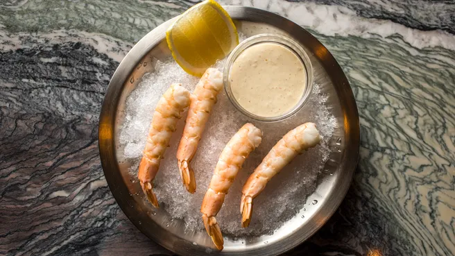 Tusk signature dishes Gulf Shrimp Cocktail
Steak Prego
Chickpea Fritter "Gildas"